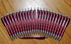 Lot of 25 Misprint Ergonomic Mantaray Stylus Click Pen -New – Black Ink – Grips