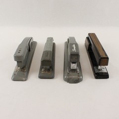 Four Vintage Swingline Staplers Gunmetal Grey (3) & one w/ Woodgrain Pattern