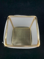 GOLD AND WHITE FAUX LEATHER DESK ORGANIZER.