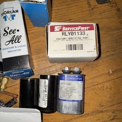 Lot Of HVAC Parts. Capacitors etc I dk what is all there. It is both used/nos