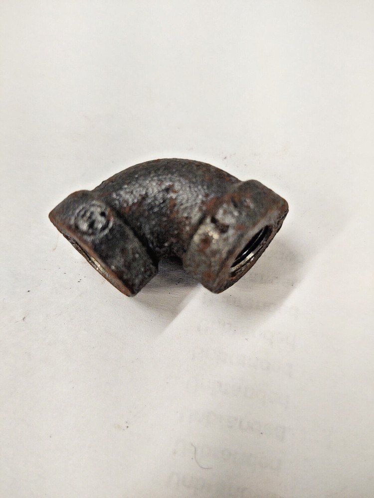 Fitting, elbow 90 degree, 1/8 FNPT x 1/8 FNPT, cast iron 125lb