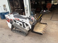 Thumb Grapple. Universal add on grapple attachment for tractors and skid steers