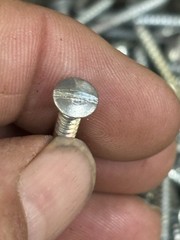 1 1/4 sheet metal screw Straight flat head. 2 Pounds 6 Ounces Of Screws