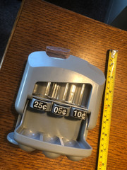 Coin sorting bank 25,10 & 5 cent folds up, push coin button to release coins