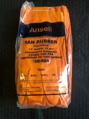 12 Pair of Ansell Gloves Tan Rubber Flocklined 13″ Length 18mil. Sz. 11, 26-665
