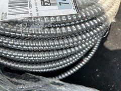 14/3 x 250 ft. Solid MC Lite Cable. Brand New Shipping Ready *Torn packaging*