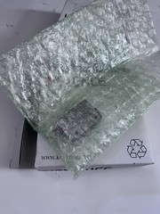 This is a Keyence LR-ZB100CP self-contained CMOS laser sensor.