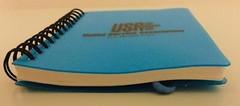 United Service Ass. ICON Mini Spiral Notebook 3 1/2”x 4 3/4” Blue Plastic Cover