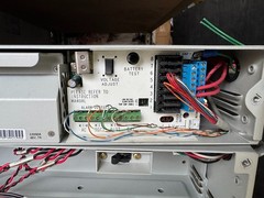 Two Eltek Valere C0350A-VC 48V power rectifiers w/chassis and two battery boxes