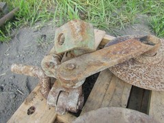 4 JOHN DEERE PLOW COULTERS WITH BRACKETS