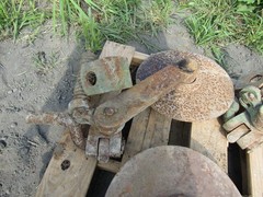 4 JOHN DEERE PLOW COULTERS WITH BRACKETS
