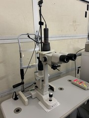 Lumenis Novus Varia Tricolor Ophthalmic Laser paired with SL950LM Slit Lamp 1000