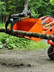 Thumb Grapple. Universal add on grapple attachment for tractors and skid steers