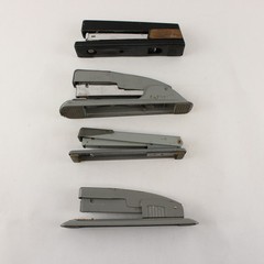 Four Vintage Swingline Staplers Gunmetal Grey (3) & one w/ Woodgrain Pattern