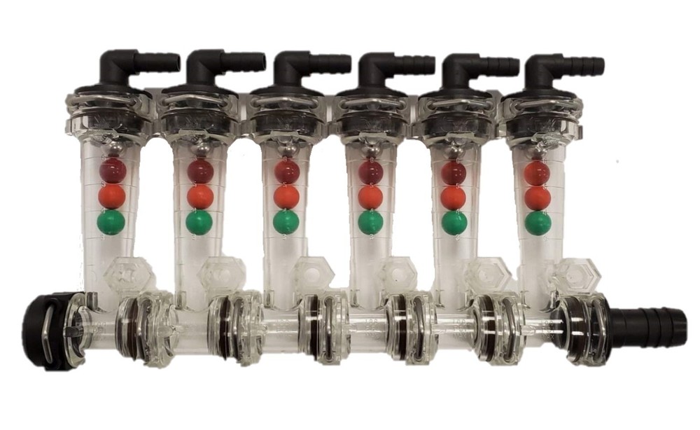 Wilger 6 Column Flow Indicator w/ 3/8″ 90° Outlets & 3/4″ Straight Inlet 20460-6