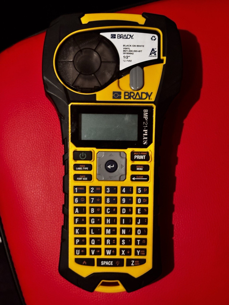 Brady BMP21-PLUS Handheld Label Maker/Printer w/ M21-500-595-WT 1/2 in