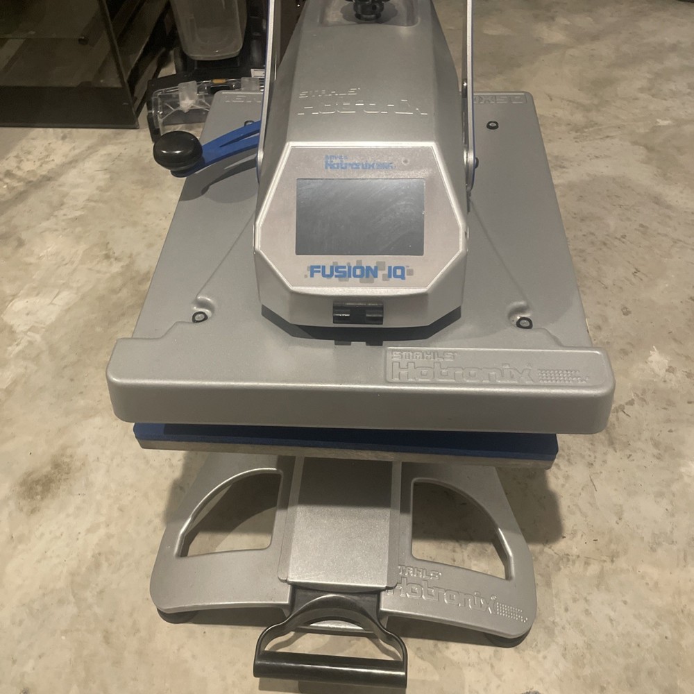 Hotronix fusion-IQ heat press machine, color gray, size is a 16in x 20in