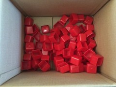 Red Vinyl PVC Square Cap covers the end of a 1-1/4″ Square Tube