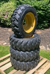 4 NEW 10-16.5 Skid Steer Tires/Wheels/Rims for Caterpillar 216-226 – CAT 10X16.5