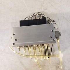 Koganei 040M6A-64W Manifold Block with (7) A040-4E1-37W Solenoid Valves 0.3MPa