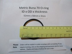 52mm ID x 58mm OD x 3mm thick O-ring. Buna-70. Quan 1.