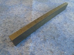 UHMW VIRGIN BLACK PLASTIC 10.000″ x 1.125″ x .500″ – SLIGHTLY OVERSIZED NEW