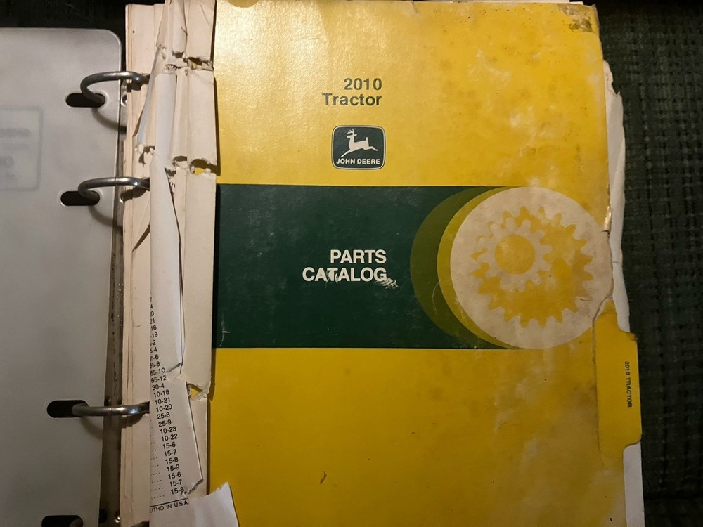 John Deere 2010 Parts Book OEM Used Fair Condition