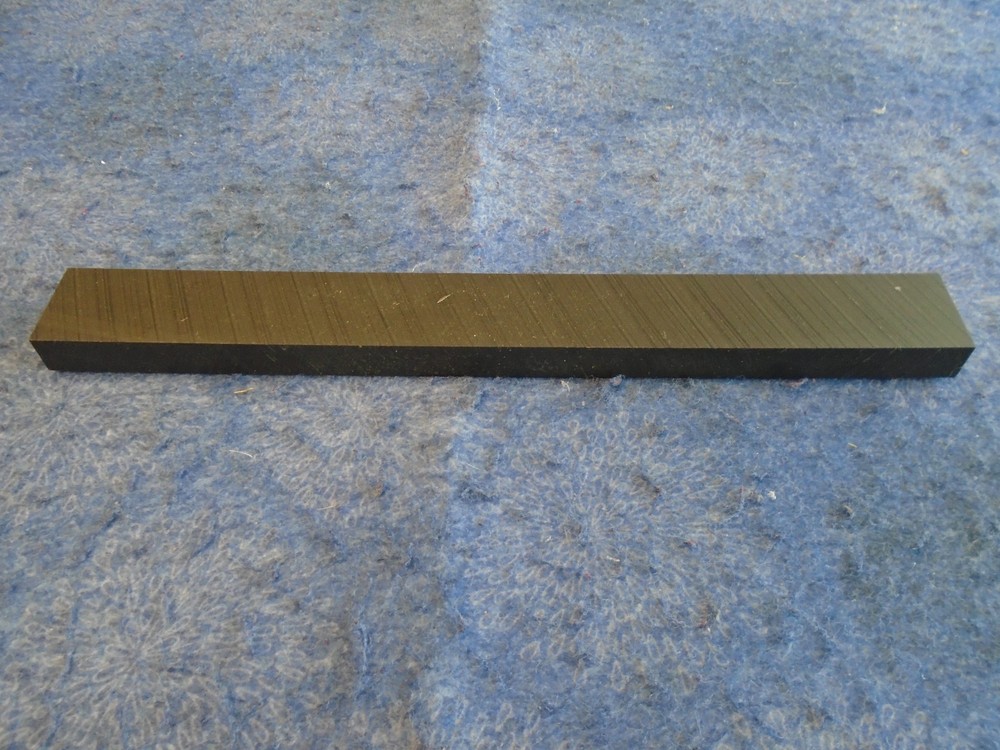 UHMW VIRGIN BLACK PLASTIC 10.000″ x 1.125″ x .500″ – SLIGHTLY OVERSIZED NEW