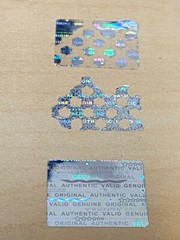 1000 CUSTOM PRINTED TAMPER EVIDENT SILVER HOLOGRAM LABELS STICKERS .75 X .60 IN.