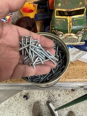 1 1/4 sheet metal screw Straight flat head. 2 Pounds 6 Ounces Of Screws