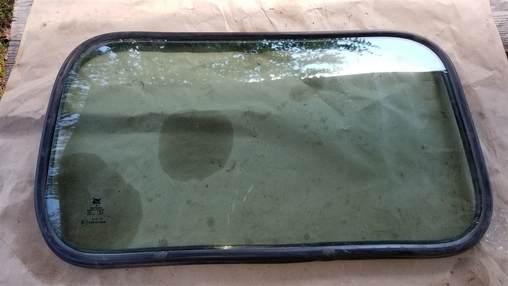 Bobcat M series rear cab window w/seal 7219974, 7219972 T590, T595, T630, T650 +