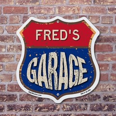 Fred’s Garage Shield Shaped Sign Weather Resistant Crafted in the USA
