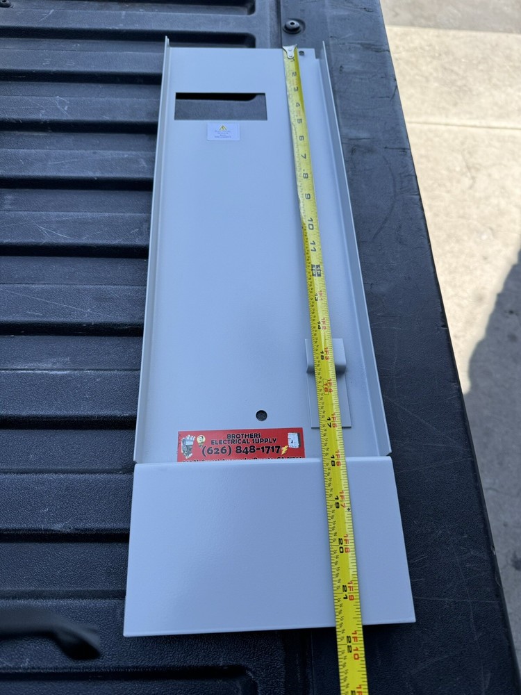 EATON DEAD FRONT COVER 200A MAIN LONG 20 3/4 WIDE 6 3/8.
