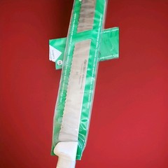 Russell International 12″ Slicer Knife Serrated High Carbon Steel White Handle