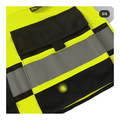 Safety green surveyor vest with tablet pocket.