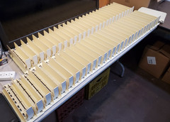 Lot of 55 RTC Profit Pusher 12″ T-Track Automatic Spring-Feed Shelf Units, Beige
