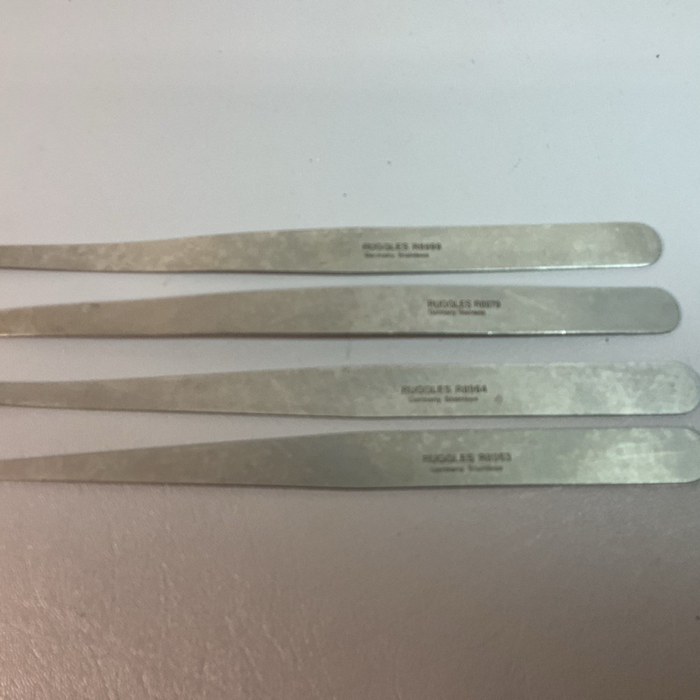 RUGGLES-REDMOND SPATULAS (4) 8963, 8964, 8979, 8999. EIGHT IN. LONG. (C201).