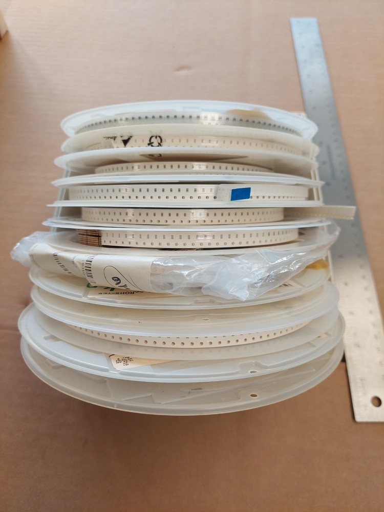 lot of 10 surface mount 0603 capacitor reels, various values