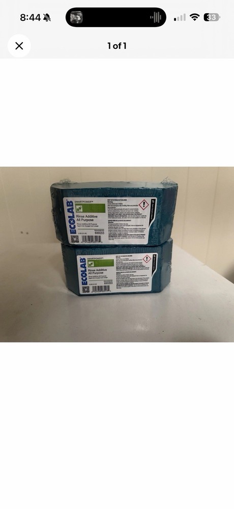 2 Ecolab Solid Rinse Additive Concentrate General Purpose blocks.