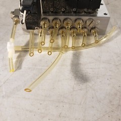 Koganei 040M6A-64W Manifold Block with (7) A040-4E1-37W Solenoid Valves 0.3MPa