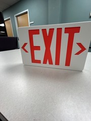 plastic exit sign (unsure if functional)
