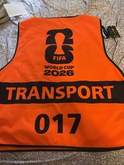FIFA World Cup 2026 Transport Orange/Black Safety Vest ” with laynard & fan ID
