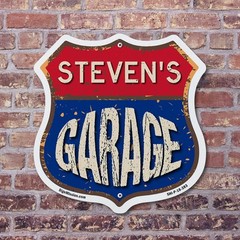 Steven’s Garage Shield Shaped Sign Weather Resistant Crafted in the USA
