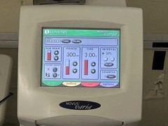 Lumenis Novus Varia Tricolor Ophthalmic Laser paired with SL950LM Slit Lamp 1000