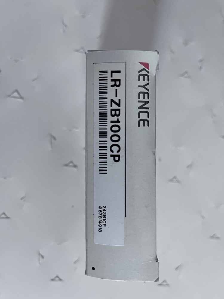 This is a Keyence LR-ZB100CP self-contained CMOS laser sensor.