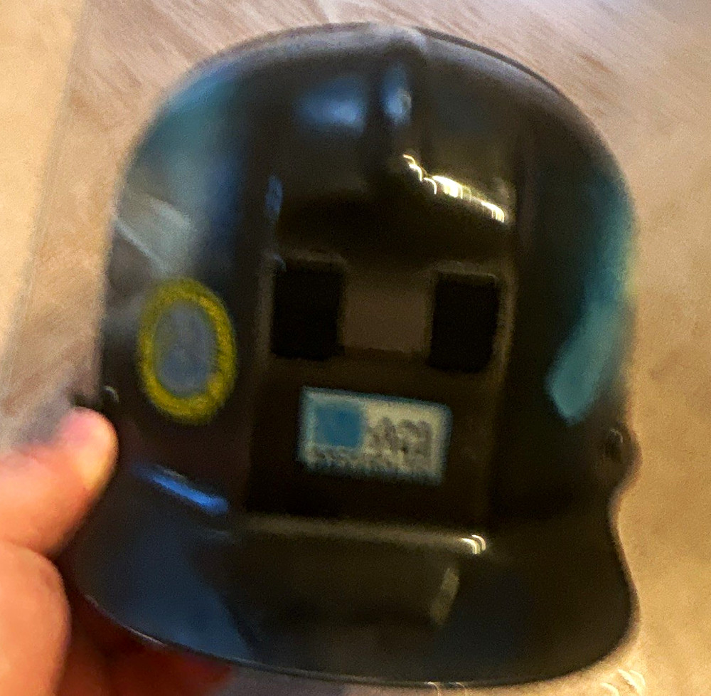 This is a custom air painted hard hat with mingo Logan and gov bob wise of wv