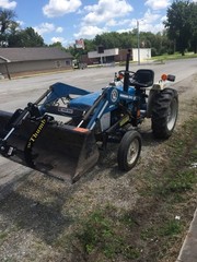 Thumb Grapple. Universal add on grapple attachment for tractors and skid steers