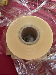 roll of BOPP (Biaxially Oriented Polypropylene) film.135mm in width, 1000m in…