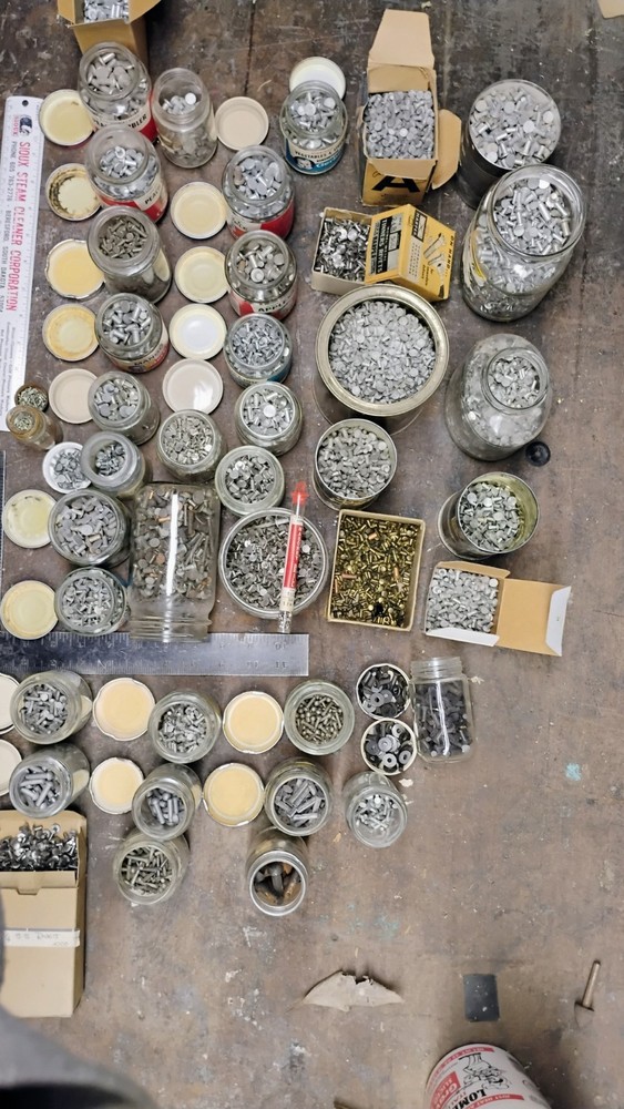 50 POUNDS OF ASSORTED TINNERS RIVETS AND OTHERS. TAKE THEM ALL.