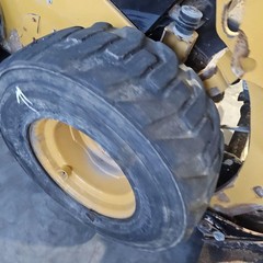 CAT 236D3 Right/Passenger Tire and Rim – Used